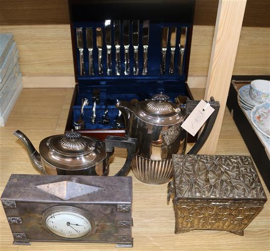 A plated canteen and demi-fluted teaset, plated timepiece and casket